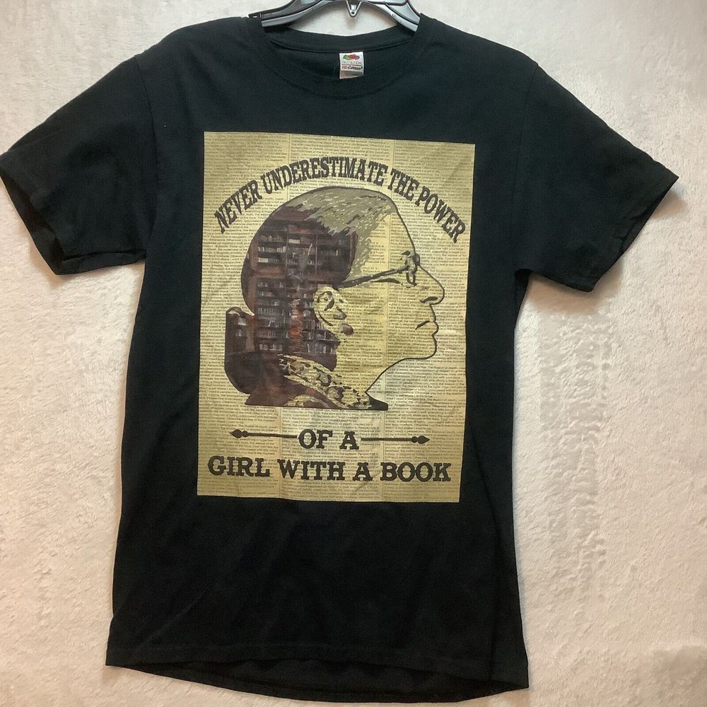 Never underestimate the power of a girl with a book shirt size small  /34 inch